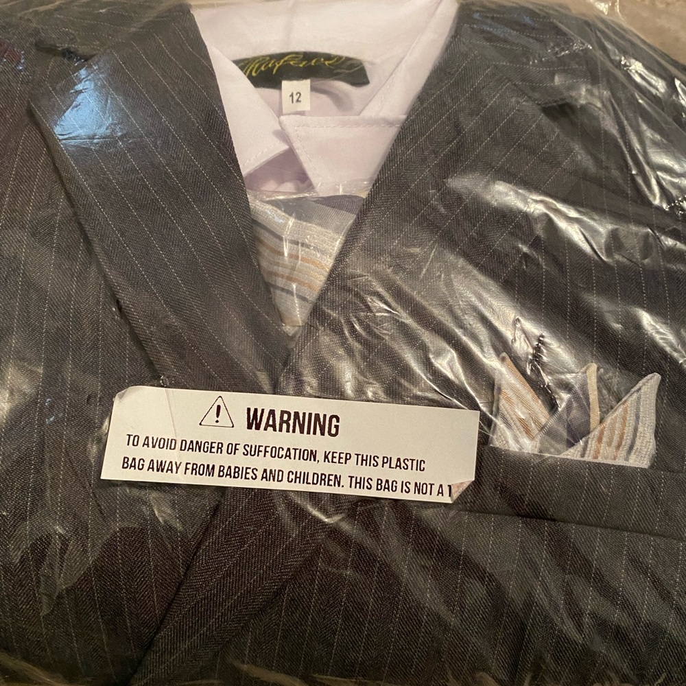 Grey and white pinstripe suit